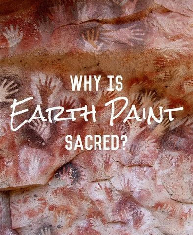 Image of a cave wall painted with many hand prints in earth tones with the words "WHY IS EARTH PAINT SACRED?" superimposed over it in white.