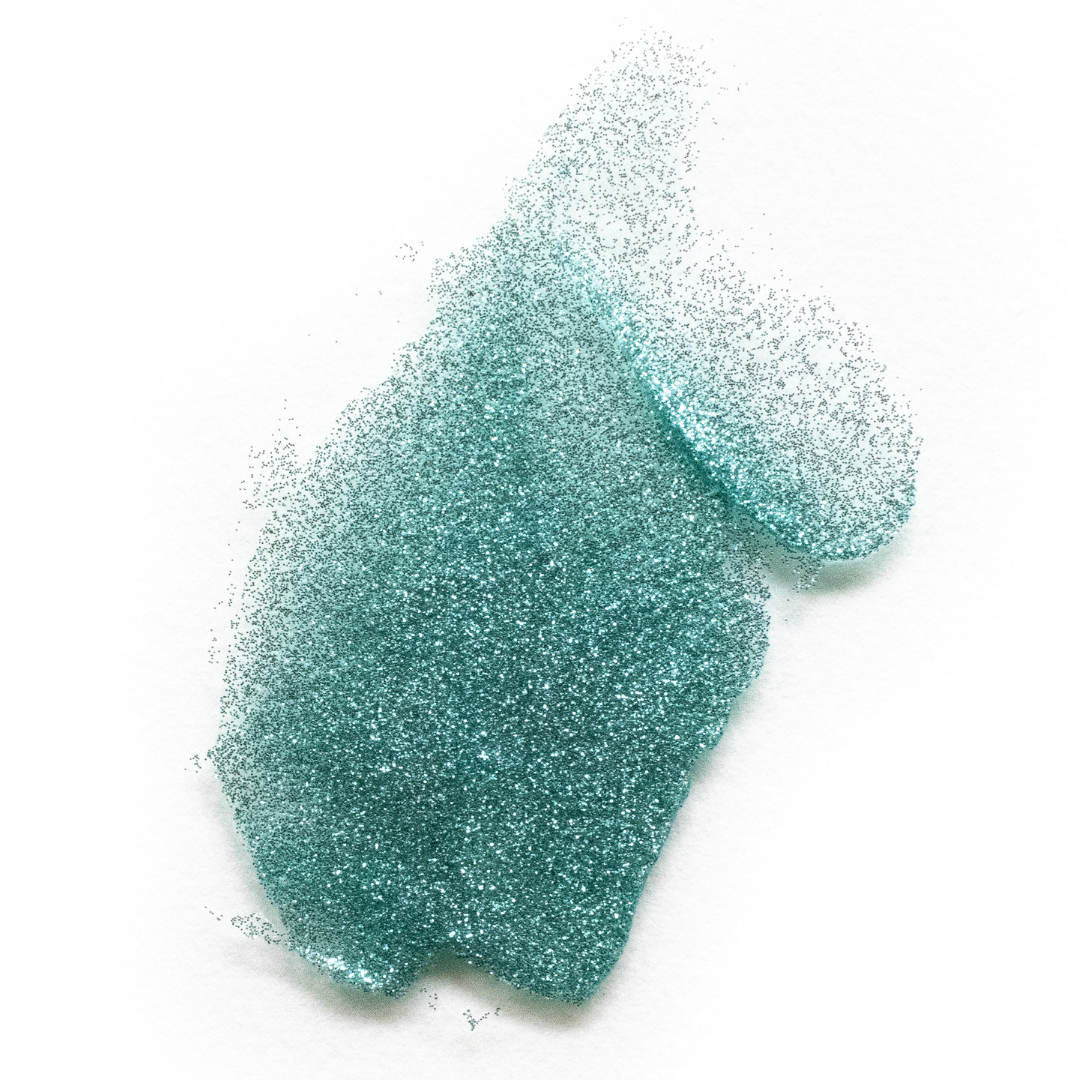 A spray of turquoise glitter