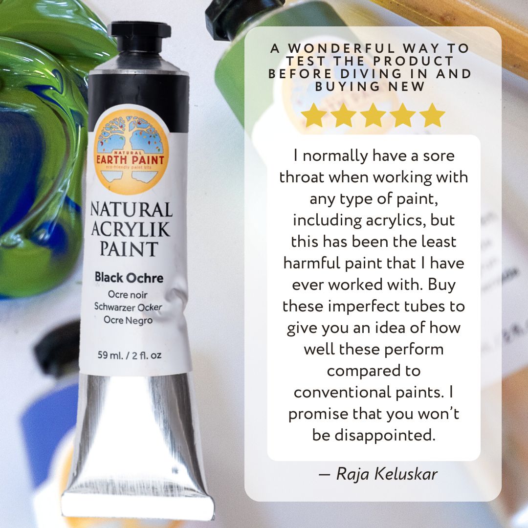 Tube of black acrylic paint next to a 5 star review of the product