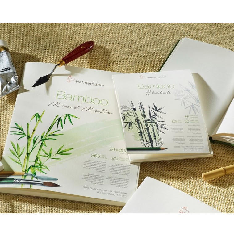 Bamboo Mixed Media Paper, Bamboo Sketch Book on burlap background with paint supplies pictured alongside