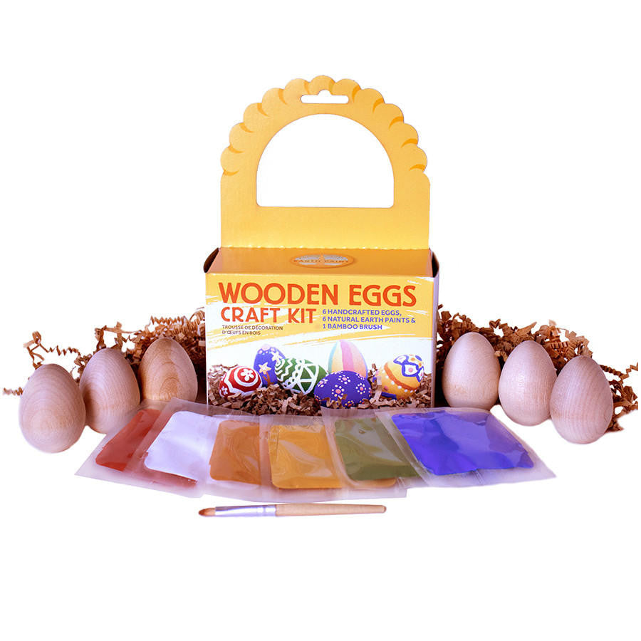 Wooden Egg Craft Kit components including the box, six wooden eggs, six color packets and a brush